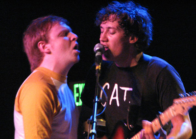 Unidentified guest vocalist, left, with The Lonely Forest's John Van Duesen