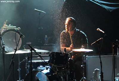 Mute Math's Darren King after pouring a bottle of water onto his drumset.